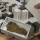 Image for article titled Arrested for Selling Fake iPhones Made of...Clay